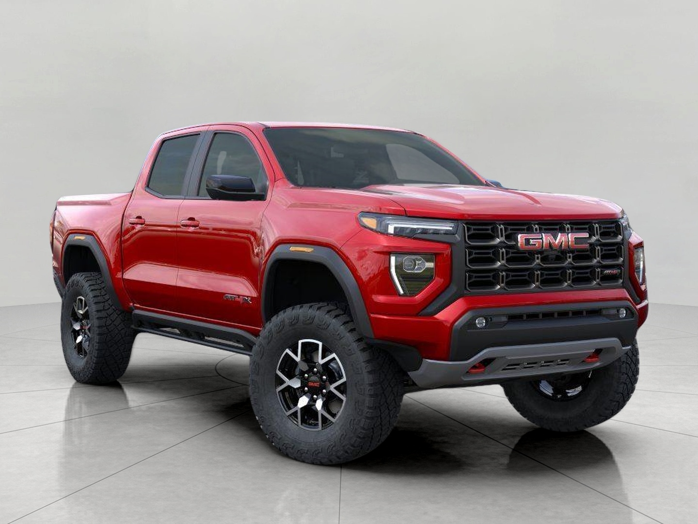 VOLCANIC RED TINTCOAT 2026 GMC Canyon AT4X Crew Cab 4WD Pickup Truck Four-Wheel Drive Automatic